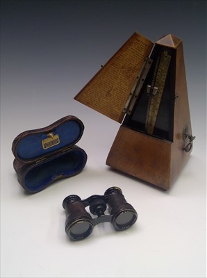 Lot 166 - A pair of opera glasses, the inner lid of case...