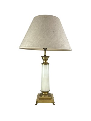 Lot 325 - A carved wooden gilt and red painted table lamp.