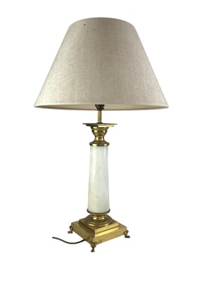 Lot 325 - A carved wooden gilt and red painted table lamp.
