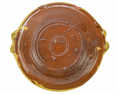 Lot 223 - A late 19th century Ewenny slipware pottery two handled dish.