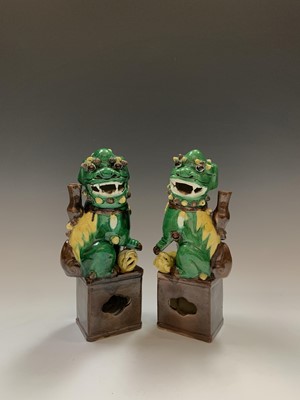 Lot 140 - A pair of Chinese famille verte joss-stick...