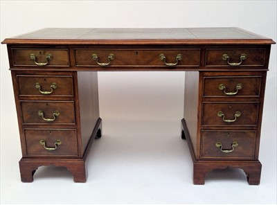 Lot 3496 - A mahogany twin pedestal desk of Georgian...