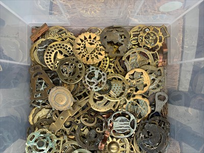 Lot 79 - A large collection of horse brasses, some on...