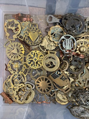 Lot 79 - A large collection of horse brasses, some on...