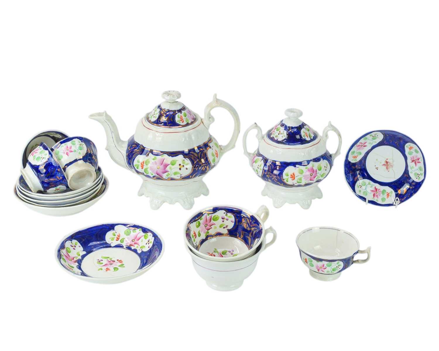 Lot 247 - A 19th century Gaudy Welsh tea set.
