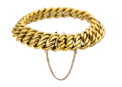 Lot 186 - An 18k gold hollow fancy twist link bracelet.