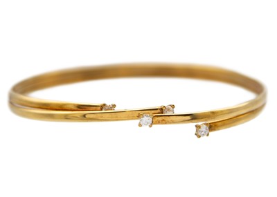 Lot 193 - A modern 9k cz set bangle.