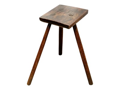 Lot 348 - A primitive oak and ash cutler's stool.