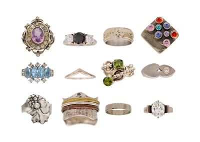 Lot 218 - A selection of ten white metal and stone dress rings.