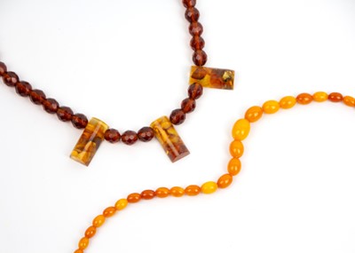 Lot 301 - Two amber-style necklaces.