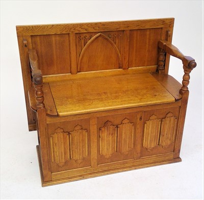 Lot 3484 - An oak monks bench, with hinged seat and...