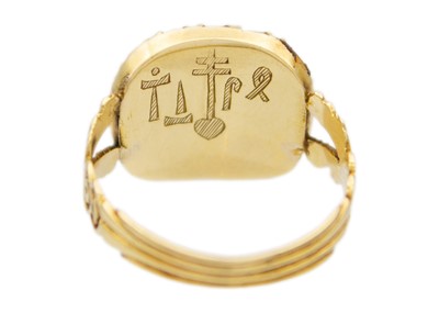 Lot 104 - An early 19th-century mourning ring with an opal replacement.
