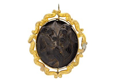 Lot 234 - A Victorian jet cameo in high purity yellow gold frame.