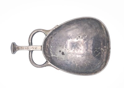 Lot 22 - An Edwardian Art & Crafts silver caddy spoon by Albert Edward Jones.