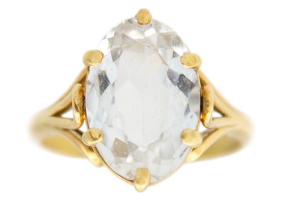 Lot 249 - An 18k gold topaz solitaire ring.