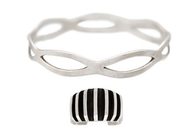 Lot 255 - A Norwegian Modernist sterling silver torque ring by Anna Greta Eker, and a silver bangle.