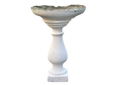 Lot 362 - A white-painted reconstituted stone bird bath.