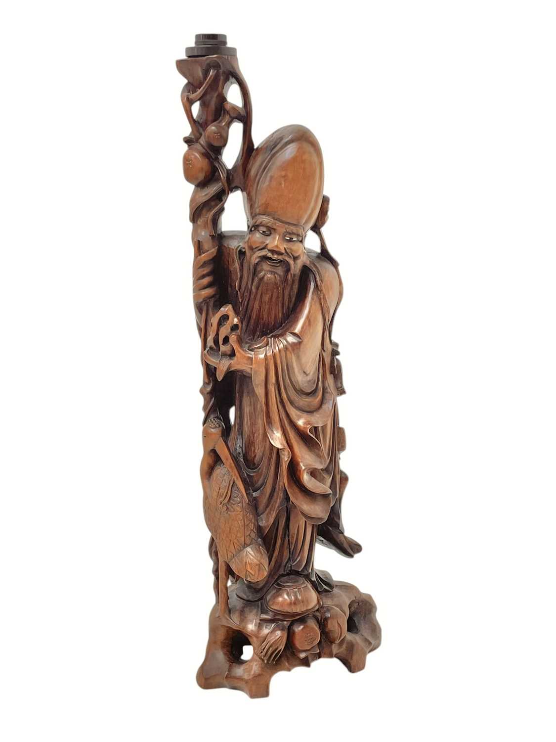 Lot 720 - A large Chinese hardwood figure of Shou Lao.