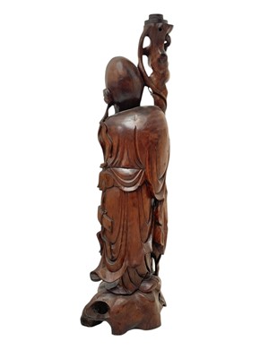 Lot 720 - A large Chinese hardwood figure of Shou Lao.