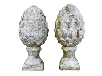 Lot 376 - A pair of reconstituted stone artichoke finials.