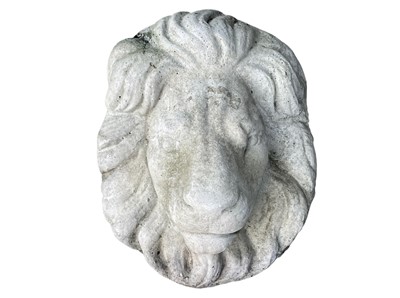 Lot 374 - A reconstituted stone lion wall mask.