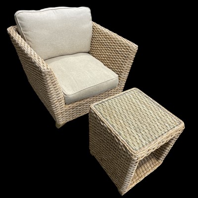 Lot 6 - A Rattan Florence patio Armchair with cushions...