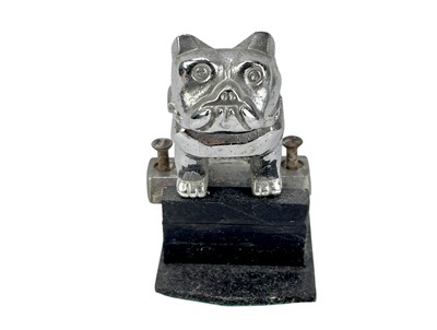 Lot 175 - A chrome plated cast metal Mack truck mascot.