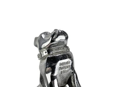 Lot 175 - A chrome plated cast metal Mack truck mascot.