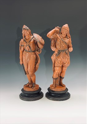 Lot 78 - Two 19th century German earthenware figures of...