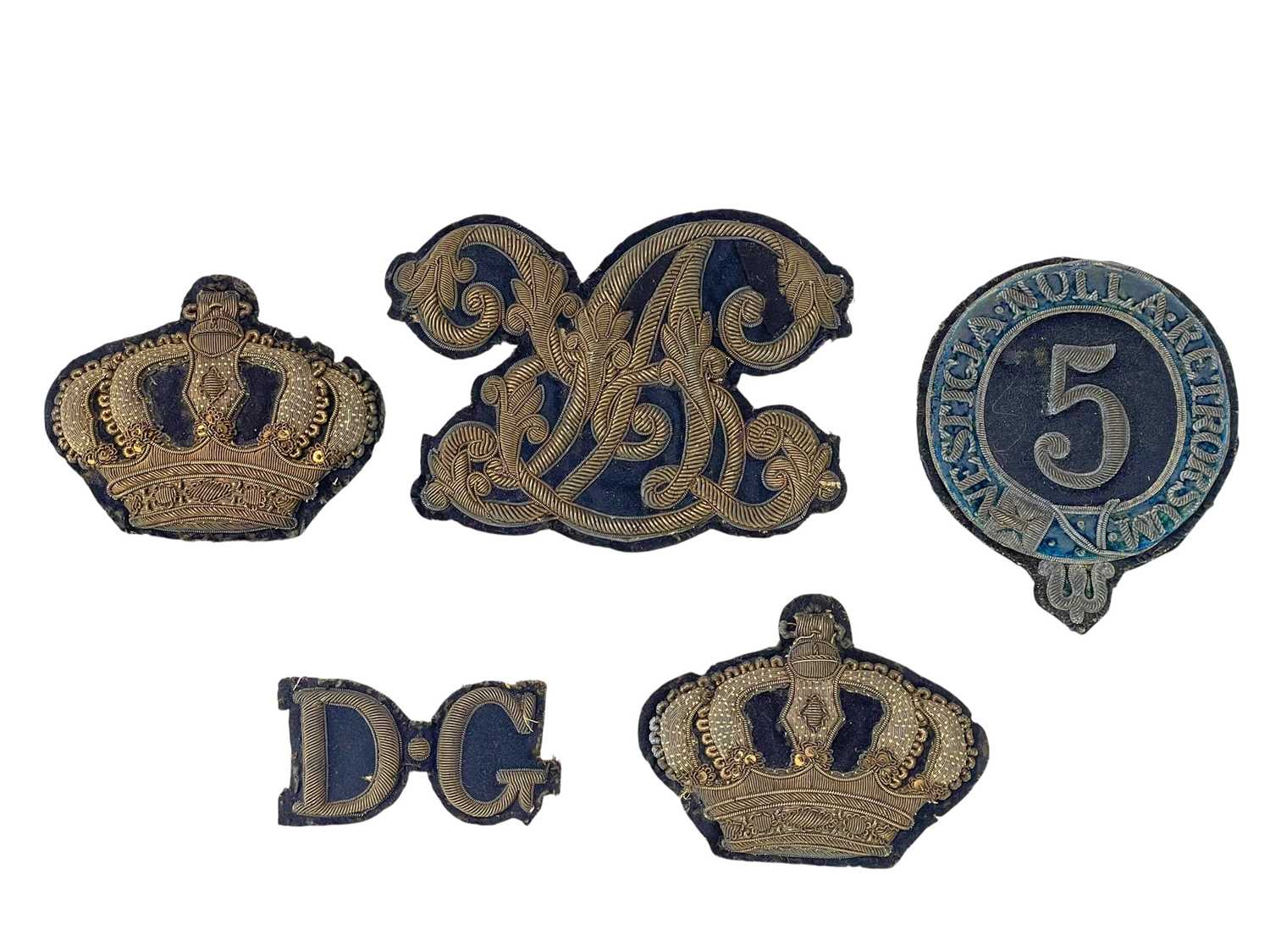 Lot 564 - Five Victorian bullion Dragoon Guards uniform badges.