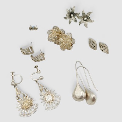 Lot 104 - A selection of seven silver pairs of earrings.