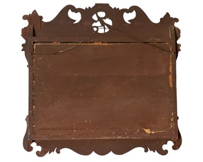 Lot 327 - A George II style walnut fretwork wall mirror.