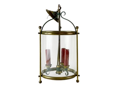 Lot 333 - A brass and glass cylindrical hall light.