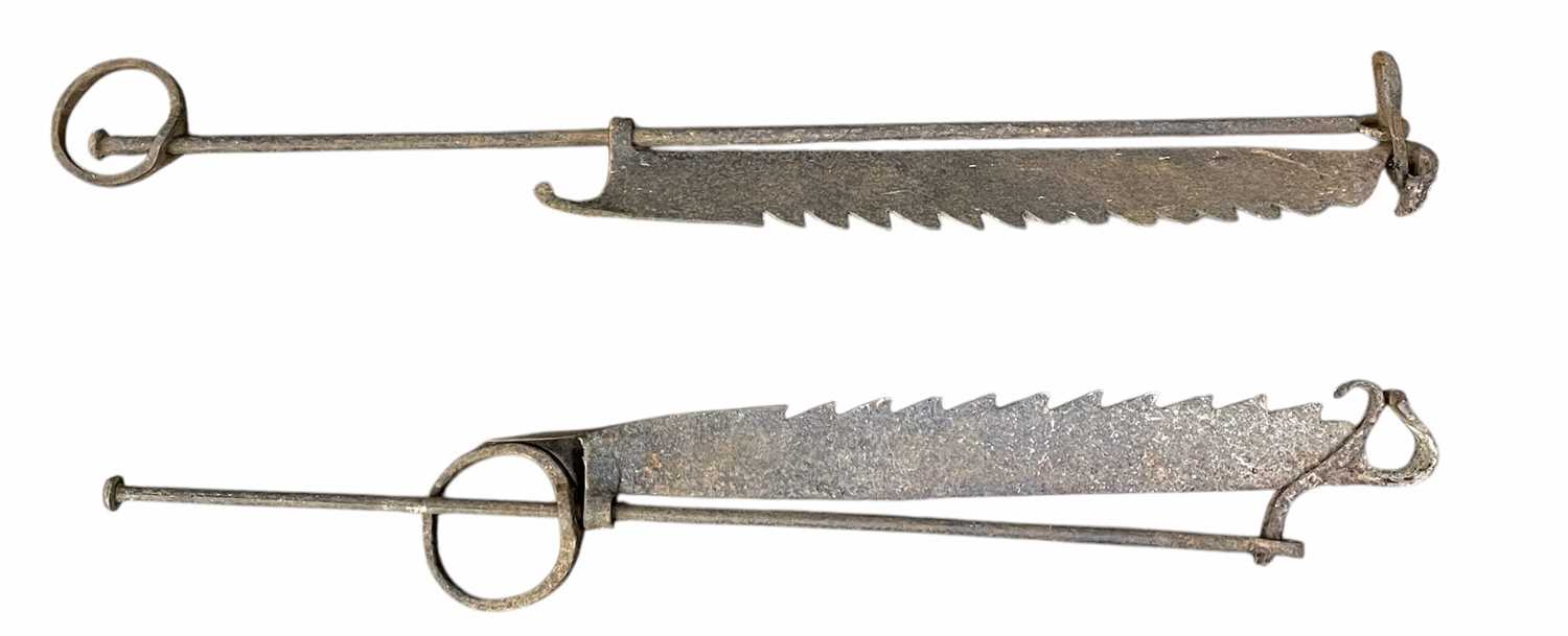 Lot 95 - Two 18th century French wrought iron sawtooth pot or trammel hooks.