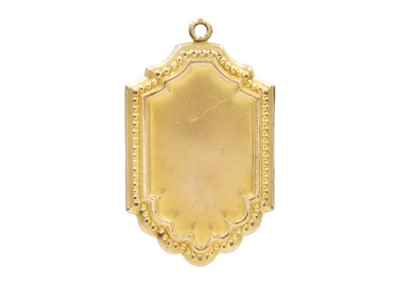 Lot 19 - A gold-plated purple paste set locket fob.