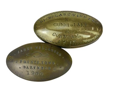 Lot 151 - Two West country brass miner's oval snuff boxes.
