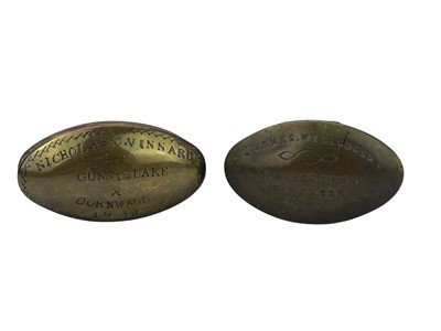 Lot 151 - Two West country brass miner's oval snuff boxes.