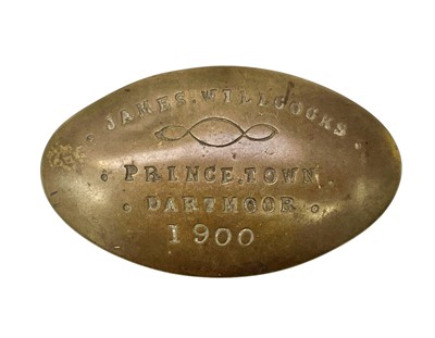 Lot 151 - Two West country brass miner's oval snuff boxes.