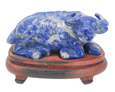 Lot 646 - A Chinese lapis lazuli carved figure of a buffalo.