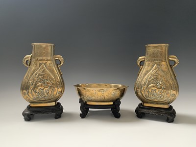 Lot 107 - A pair of Chinese bronze pear-shaped vases,...