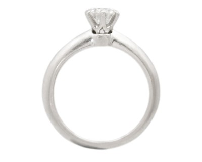 Lot 11 - TIFFANY & CO - A good platinum 0.59ct diamond solitaire ring with certificate and box.