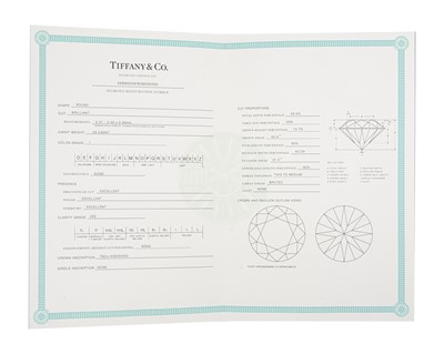 Lot 11 - TIFFANY & CO - A good platinum 0.59ct diamond solitaire ring with certificate and box.