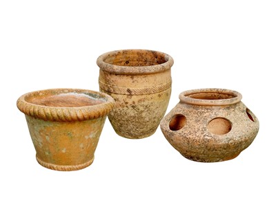 Lot 360 - Three terracotta garden plant pots.