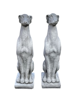 Lot 377 - A pair of reconstituted stone sculptures of seated whippets