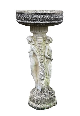 Lot 371 - A reconstituted stone bird bath.