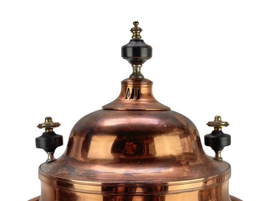 Lot 58 - A copper tea urn.