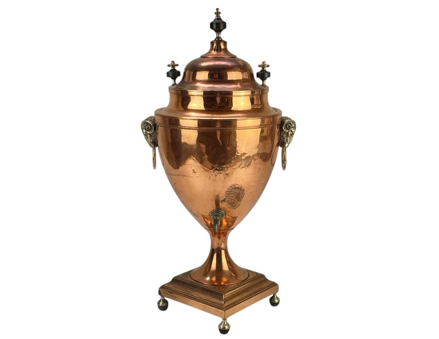 Lot 58 - A copper tea urn.