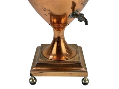 Lot 58 - A copper tea urn.