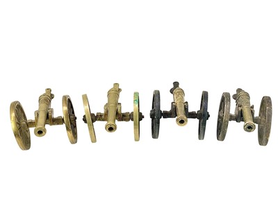 Lot 56 - Four field artillery model desk cannons.