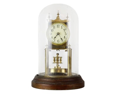 Lot 399 - A Gustav Becker brass torsion clock.